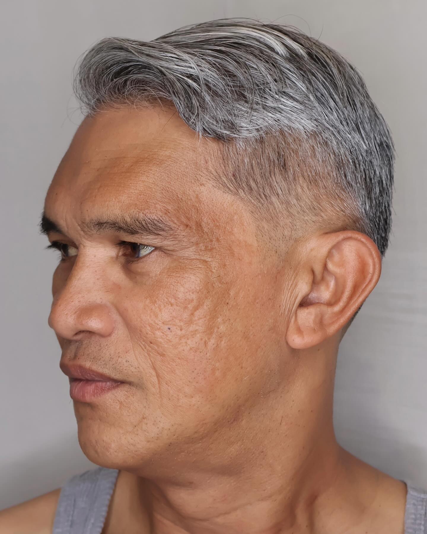 Side Parted Gray Hairstyle for Older Men